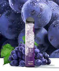 Vozol Grape Ice vape with fresh grapes in the background