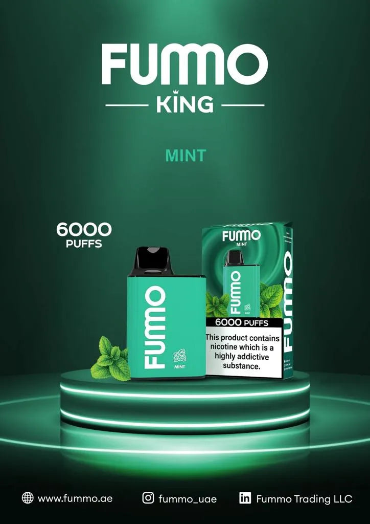 FUMO King Mint vape 6000 puffs with mint leaves and packaging on green display