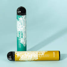 Vozol Refreshing Mint and Banana Ice vapes on blue background